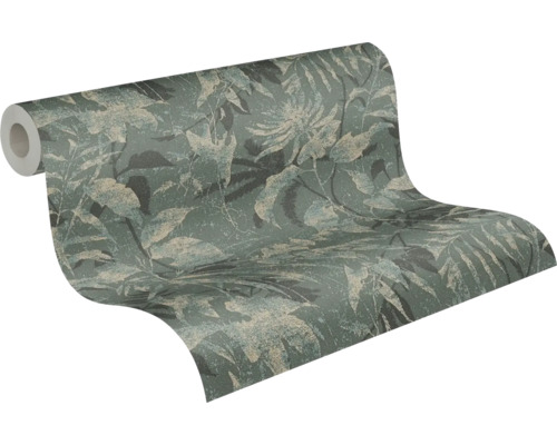 Papier peint intissé avec motif botanique de feuilles et fleurs, surface texturée.
