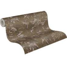 Papier peint intissé avec motif de feuilles botaniques en brun et beige, surface légèrement texturée.