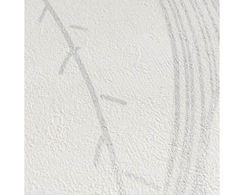 Gros plan d'un papier peint texturé avec un motif de feuilles scintillant.