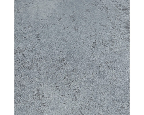 Gros plan d'un papier peint aspect béton avec une surface structurée.