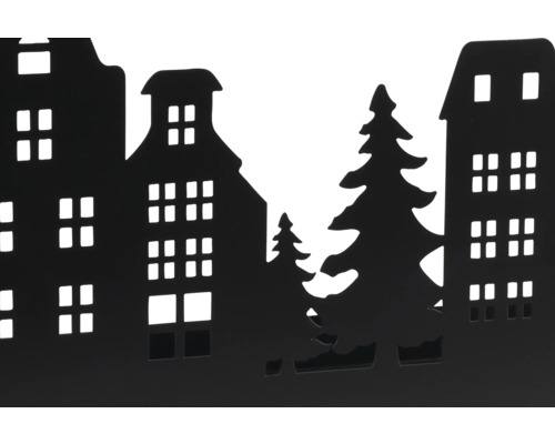 Silhouette noire d une rangée de maisons avec des sapins pour la décoration.