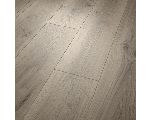 Revêtement de sol stratifié décor chêne, veinage structuré et chanfrein en V.