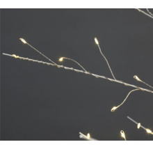 Branche de décoration à LED avec lumières blanc chaud sur une branche blanche.