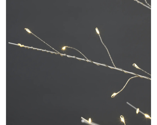 Branche de décoration à LED avec lumières blanc chaud sur une branche blanche.