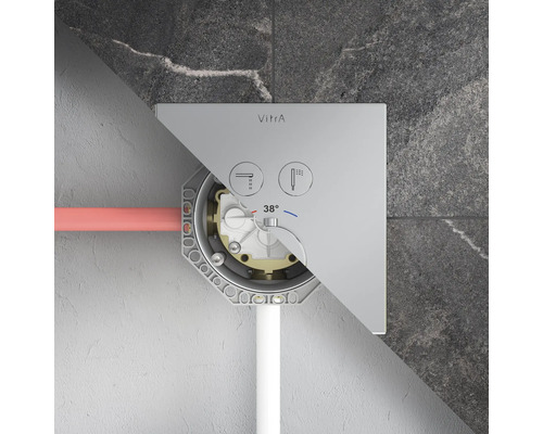 Vue en coupe d'un mitigeur thermostatique encastré VitrA avec corps d'encastrement, symboles pour baignoire et douche et affichage de 38 degrés.