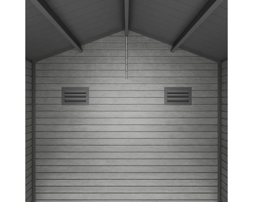 Vue intérieure d une cabane de jardin avec des panneaux muraux horizontaux, deux grilles de ventilation et un pignon sous le toit.