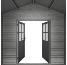 Vue intérieure d un abri de jardin en bois avec une double porte ouverte et un toit à pignon.