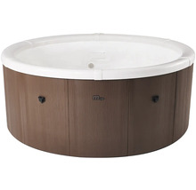 Spa rond de MSpa avec panneaux aspect bois et intérieur blanc.
