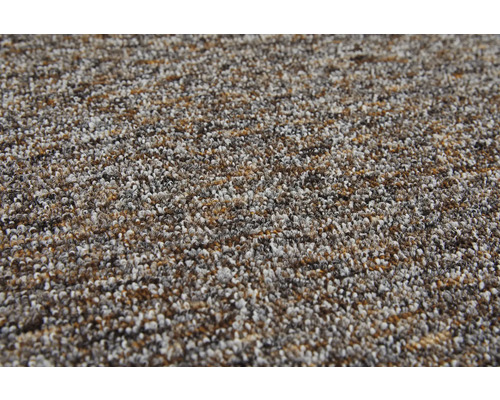 Nahaufnahme eines strukturierten Teppichbodens mit meliertem Muster.