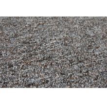 Gros plan d'une moquette avec un velours bouclé multicolore.