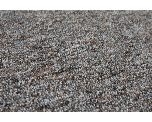 Gros plan d'une moquette avec un velours bouclé multicolore.