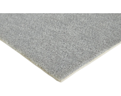 Moquette grise avec surface texturée et envers clair.