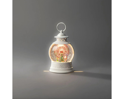 Lanterne de Noël blanche boule à neige avec Père Noël, sapin et éclairage.