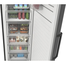 Vue intérieure d'un congélateur ouvert avec des tiroirs transparents et une Big Box, rempli de divers aliments.