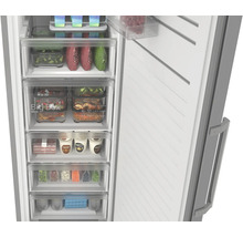 Intérieur d'un congélateur ouvert avec tiroirs transparents, compartiment Big Box et aliments surgelés rangés de manière ordonnée.