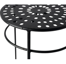 Tabouret en métal avec plateau perforé rond et structure noire.