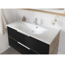 Moderner Waschtischunterschrank mit dunkler Front, Seiten in Holzoptik, weißem Keramikwaschbecken und verchromter Armatur.