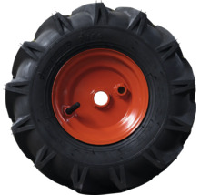 Pneu agraire sur jante en acier orange pour motoculteur ou motobineuse.