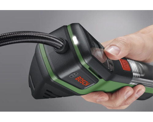 Pompe à air comprimé sans fil Bosch tenue à la main avec Bosch Logo, lampe intégrée, écran et tuyau flexible.