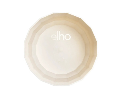 Vue de dessus d'un pot de fleurs Elho à facettes en plastique avec le elho Logo au centre.