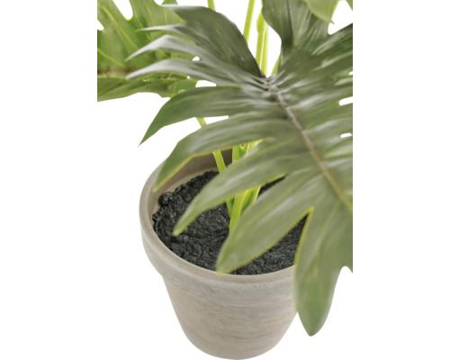 Plante artificielle de Philodendron dans un pot en pierre