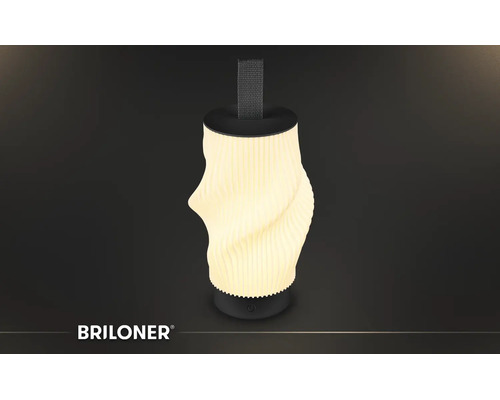 Tragbare Briloner LED-Tischleuchte mit gerippter Oberfläche, Trageschlaufe aus Textil und Touch-Schalter am Sockel.