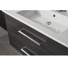 Meuble sous-vasque avec deux tiroirs aspect bois et lavabo en céramique blanche.