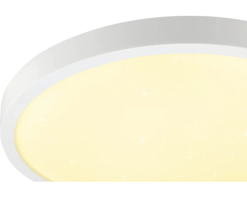 Plafonnier LED rond en plastique avec effet ciel étoilé.