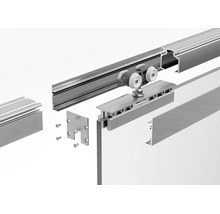Vue éclatée d'un système de porte coulissante en aluminium avec rail de guidage, chariot à roulettes et éléments de fixation.