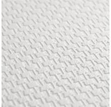 Papier peint structuré avec un motif géométrique en relief.
