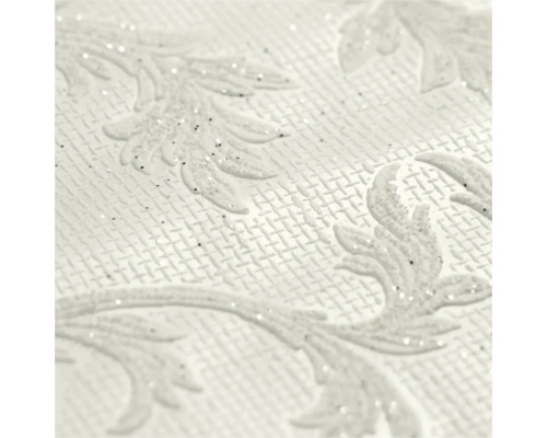 Papier peint texturé avec motif de feuilles damassées en relief et paillettes argentées sur fond tissé.