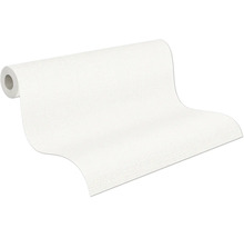 Papier peint partiellement déroulé avec une surface à grain fin.