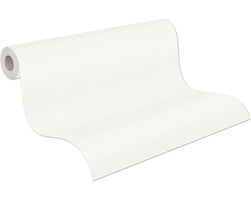 Papier peint partiellement déroulé avec une surface à grain fin.