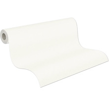 Un rouleau de papier peint blanc lisse, partiellement déroulé.