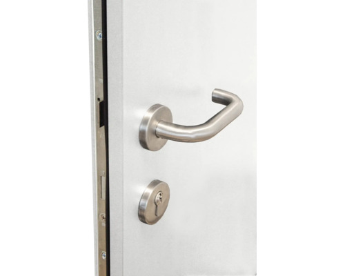 Poignée de porte en acier inoxydable avec rosace ronde et serrure à cylindre profilé sur une porte.