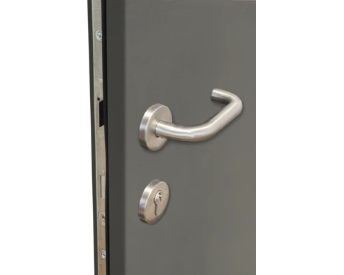 Garniture de poignée de porte en acier inoxydable avec rosace ronde et perforation pour cylindre profilé.