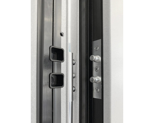 Vue détaillée d'un verrouillage multipoint pour portes avec pênes et gâche métallique.