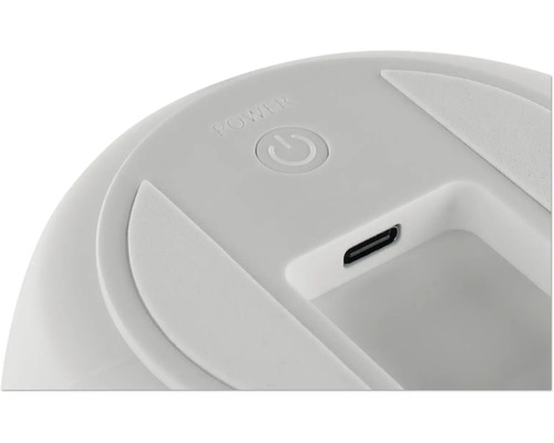 Nahaufnahme einer Power-Taste und eines USB-C-Anschlusses an einem elektronischen Gerät.
