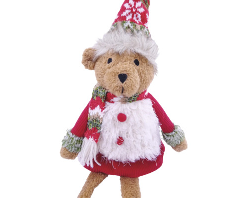 Ours en peluche comme décoration de Noël avec pull en tricot rouge, écharpe et bonnet.