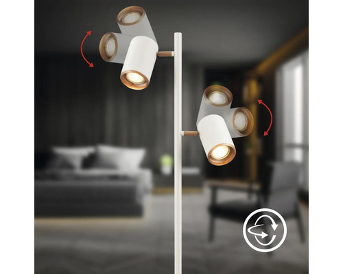 Lampadaire blanc avec deux spots orientables et détails en bois, pivotant à 360 degrés.