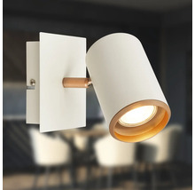 Applique murale orientable en blanc et cuivre avec tête cylindrique et plaque de montage rectangulaire.