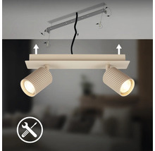 Spot de plafond à deux lampes avec têtes de lampe nervurées et illustration du montage sur le support.