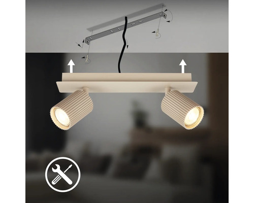 Spot de plafond à deux lampes avec têtes de lampe nervurées et illustration du montage sur le support.
