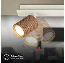 Tête de spot de plafond orientable avec une structure nervurée.