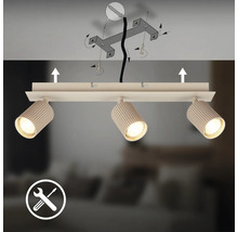 Plafonnier avec trois spots orientables et schéma de montage au plafond avec support et vis.