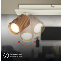Spot de plafond avec tête orientable et rainurée, aspect bois.