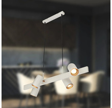 Suspension moderne avec quatre spots orientables sur une barre, montage au plafond, métal.