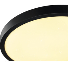 Plafonnier LED rond avec bord noir et diffuseur à effet ciel étoilé.