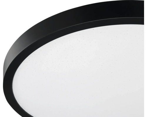 Plafonnier LED rond avec bordure noire et diffuseur blanc à effet étoilé.