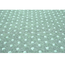 Sous-couche de tapis antidérapante avec revêtement en pointillés pour une fixation sécurisée des tapis.